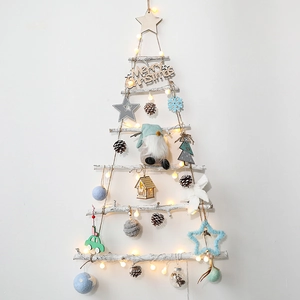DIY wooden Christmas tree wall hanging with LED lights, gnomes and assorted ornaments