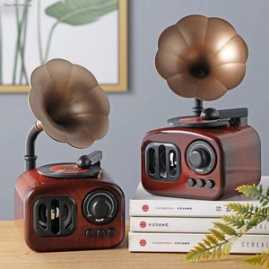 Retro gramophone music box with a vintage horn and wood grain finish for home decor