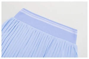Detail of high-elastic ribbed waistband with white stripes on a sky blue pleated tennis skirt