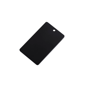 Macro detail of a black rectangular mirror stainless steel pet tag with round corners