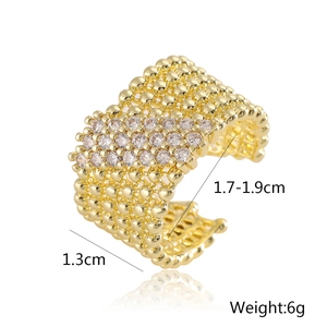 Detail view of 18K gold plated wide band ring with white zircon stones and 1.3cm width