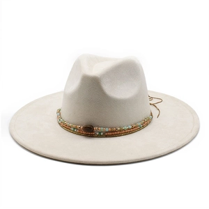Detail of cream wide-brim felt hat with bohemian beaded band and tiger eye stone