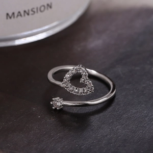 Elegant adjustable silver ring with zircon heart and six-prong round stone design