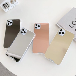 Flat lay of four acrylic mirror phone cases in black, silver, rose gold and gold colors
