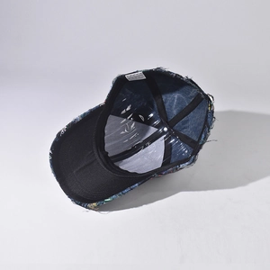 Inside view of baseball cap with Chinese lace pattern and breathable mesh structure