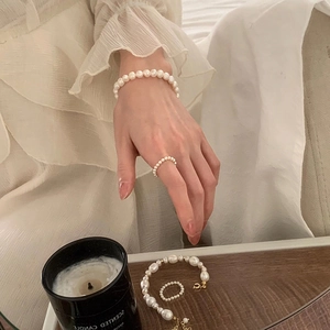 Elegant natural freshwater pearl bracelet and ring set with gold plated metal finish