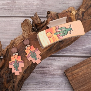 Western cowboy style cactus sunflower hair claw clip and matching earring set on wood