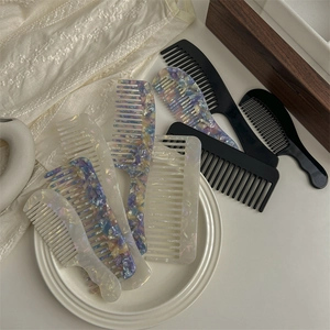 Elegant vintage tortoiseshell wide-tooth hair combs set in multiple pearlescent finishes