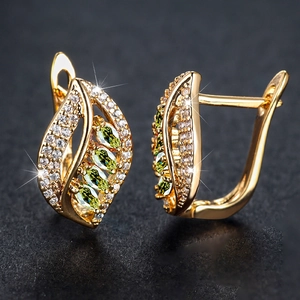 Champagne gold leaf drop earrings with marquise green zircon and crystal accents
