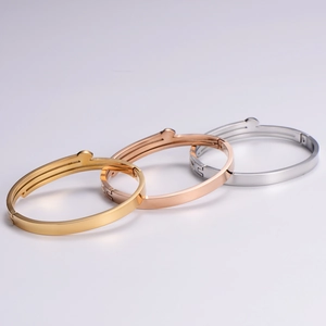 Three-color titanium steel nail bangles in gold, rose gold, and silver finishes
