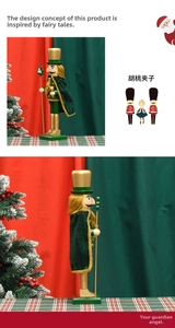 Detail of 38cm wooden nutcracker with gold jacket, green velvet cloak and clover staff