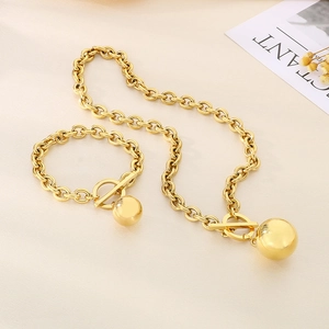 Polished gold OT clasp necklace and bracelet set with round metallic ball pendants