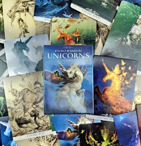 Artistic layout of Unicorns Oracle cards and blue box by Paolo Barbieri in detail