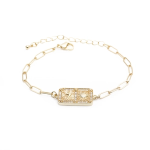 Hip hop gold bracelet featuring zircon-studded lightning and sun relief charms