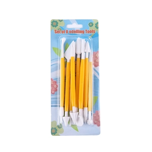 8-piece yellow and white fondant cake modeling tool set in blister pack packaging