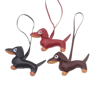 Cute faux leather dachshund keychains in black, burgundy, and brown with matching lanyards