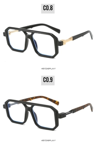 Detail view of square pilot sunglasses showing black and tortoiseshell temples with blue lenses