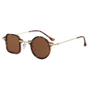 Fashionable oversized asymmetrical amber sunglasses with one square and one round lens frame