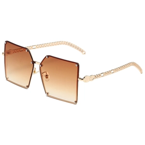 Oversized square sunglasses with gold chain temples and brown gradient lenses