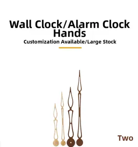 Macro detail of walnut and light wood hollow clock hands on a white background