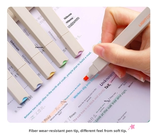 Close-up of Morandi soft tip highlighter marking text on paper with smooth ink flow