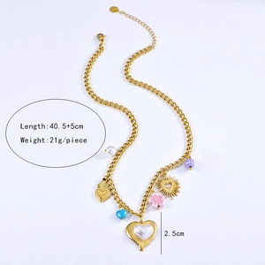 Detail showing gold chain necklace with colorful charms, heart, and size measurements
