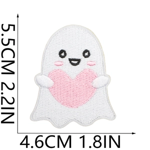Macro detail of ghost embroidery patch with pink heart showing stitching and size 5.5cm