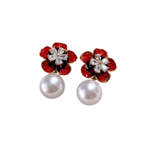 Elegant gold earrings featuring red enamel flowers, zircon centers and white pearls