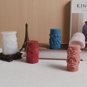 Cylindrical sunflower and tulip relief candle silicone mold with floral wax finished products