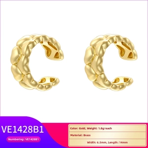 Detailed view of brass hollow heart cuff earring measuring 6.5mm wide and 14mm long
