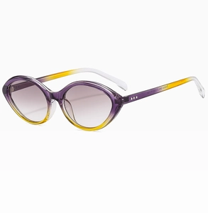 Detail of vintage cat-eye sunglasses with purple-yellow gradient frame and rivets