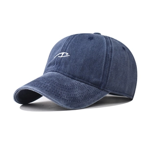 Navy blue washed cotton baseball cap with cartoon eyes embroidery and vintage distressed finish
