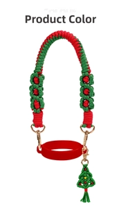 Detail of red and green hand-woven cup strap with Christmas tree charm and gold clips