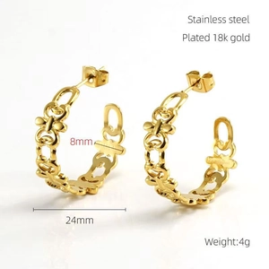 Close-up of 18k gold plated stainless steel hoop earrings showing 24mm diameter size