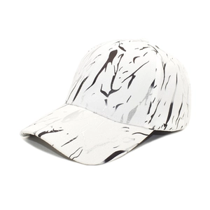 Stylish unisex baseball cap featuring artistic black graffiti on a white marble texture