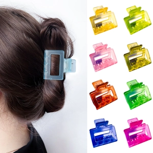 Square hollow matte candy-colored hair claw clips available in nine vibrant translucent shades