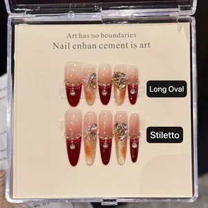 Handmade gradient red-brown press-on nails with metallic butterflies and pearls