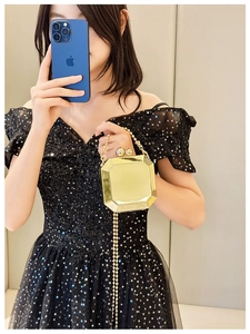 Octagonal gold geometric evening clutch bag with pearl clasp and chain strap