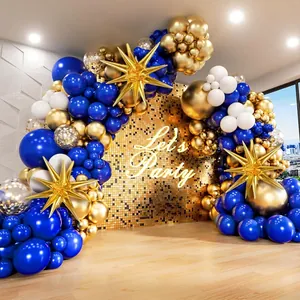 Deep blue and gold balloon arch kit with metallic star accents and neon party sign