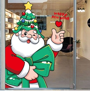 Detailed view of Santa Claus window stickers with Christmas tree hat and festive text