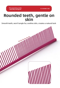 Detail of pink pet grooming comb showing smooth rounded steel teeth for hair styling