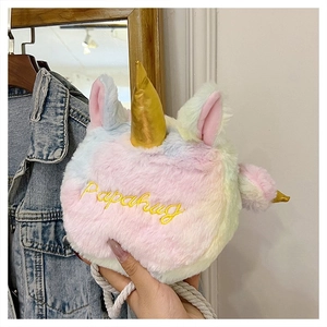 Detail of plush rainbow unicorn crossbody bag with Papahug embroidery and golden horns