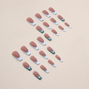 Light blue French ballerina press-on nails with green glitter and white polka dots