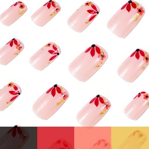 Short square press-on nails with floral pattern and gold foil accents in pale pink