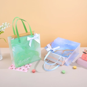 Sacs cadeaux givrés transparents avec nœuds en soie et lettrage Thank You