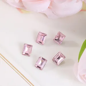 Detailed macro view of 8x10mm pink rectangular rhinestone gems for DIY nail art and jewelry