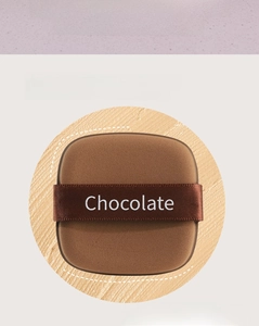 Macro detail of the chocolate air cushion puff showing precise square and flat edges
