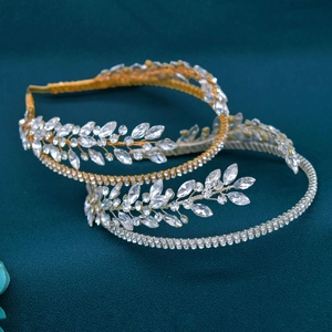 Handmade bridal headband set with gold and silver finishes and marquise crystals