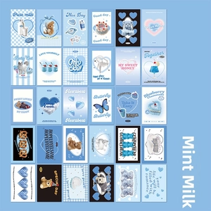 Grid layout of 30 vintage aesthetic mint blue postcards with cute teddy bear and cat motifs