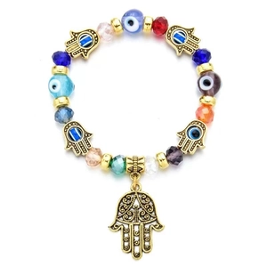 Bracelet extensible avec main de Fatma dorée, perles Mauvais Œil et cristaux facettés